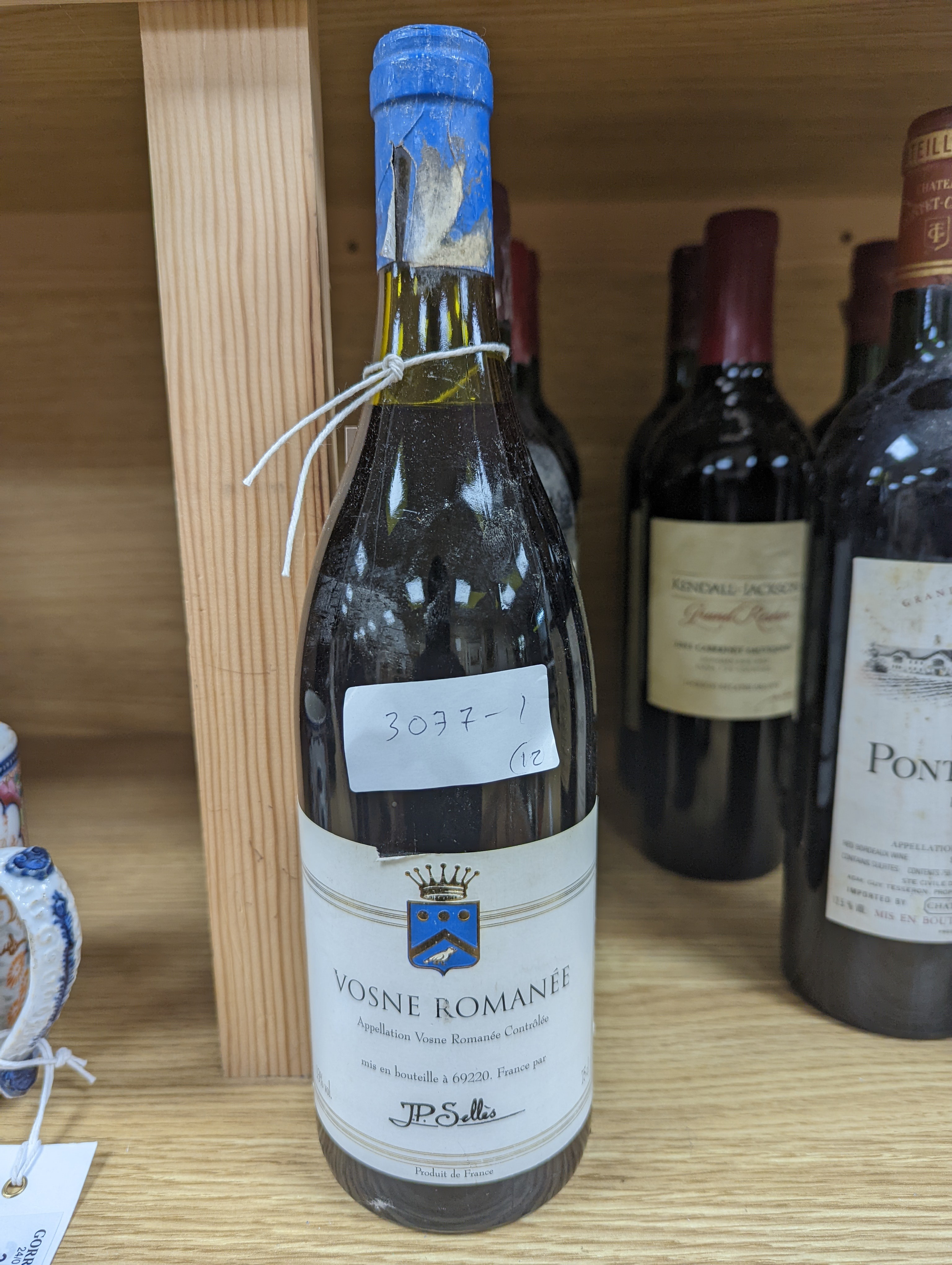 Twelve assorted bottles of wine including one Opus One, 1988, one Vosne Romanee, Jean Paul Selles, 1992, one Chateau Cazauviel, Margaux 1993, Chateau Pontet-Canet, 1986 and Brunello Montalcino, 1985 & 1991 etc.